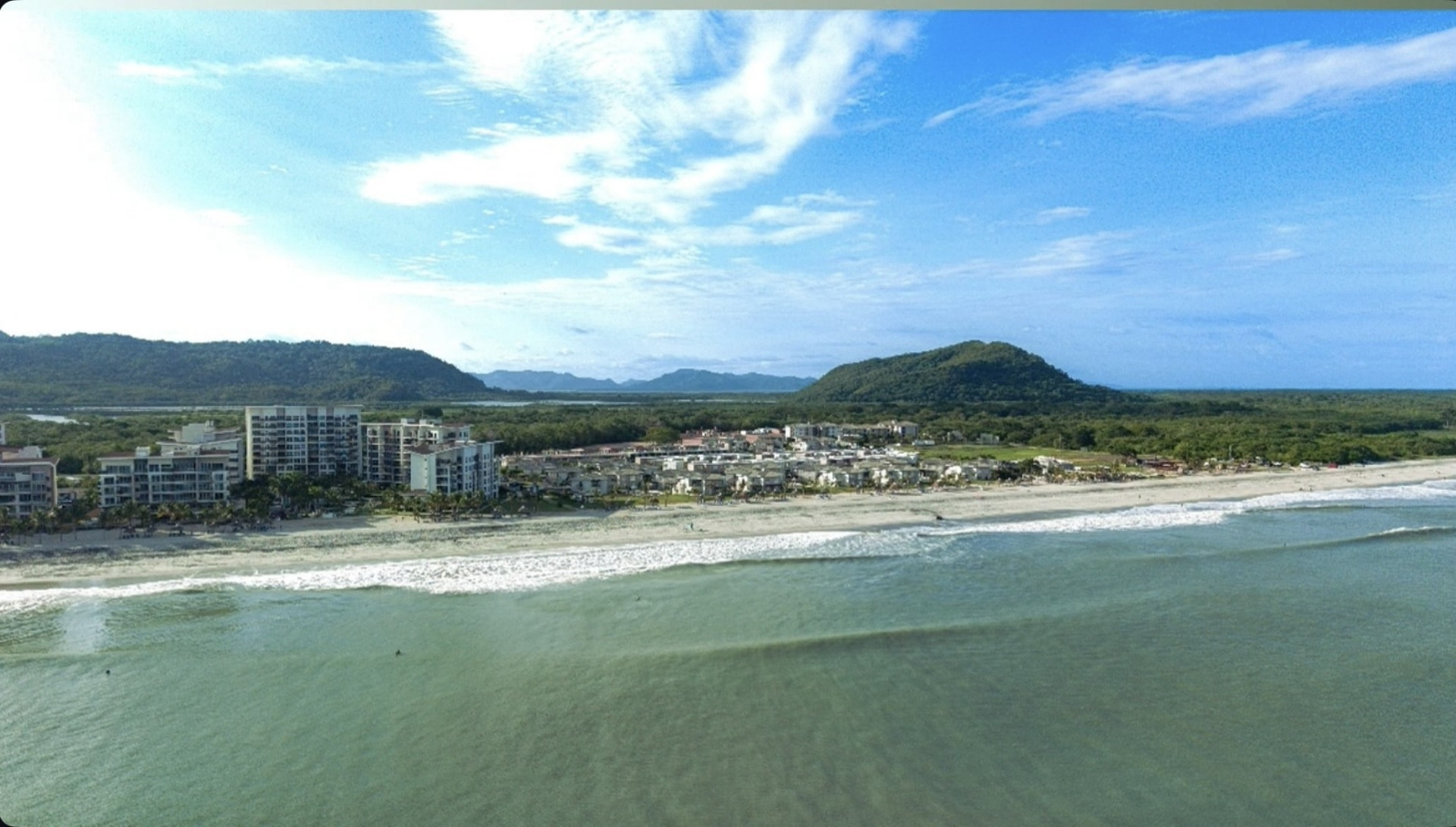 Aerial view of Playa Caracol beach and beachfront residences in Panama